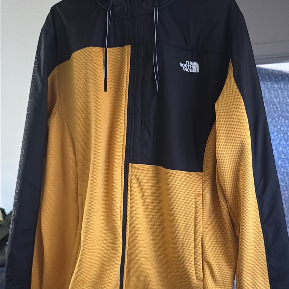 The North Face Black and Gold Jacket men’s xl. NWOT